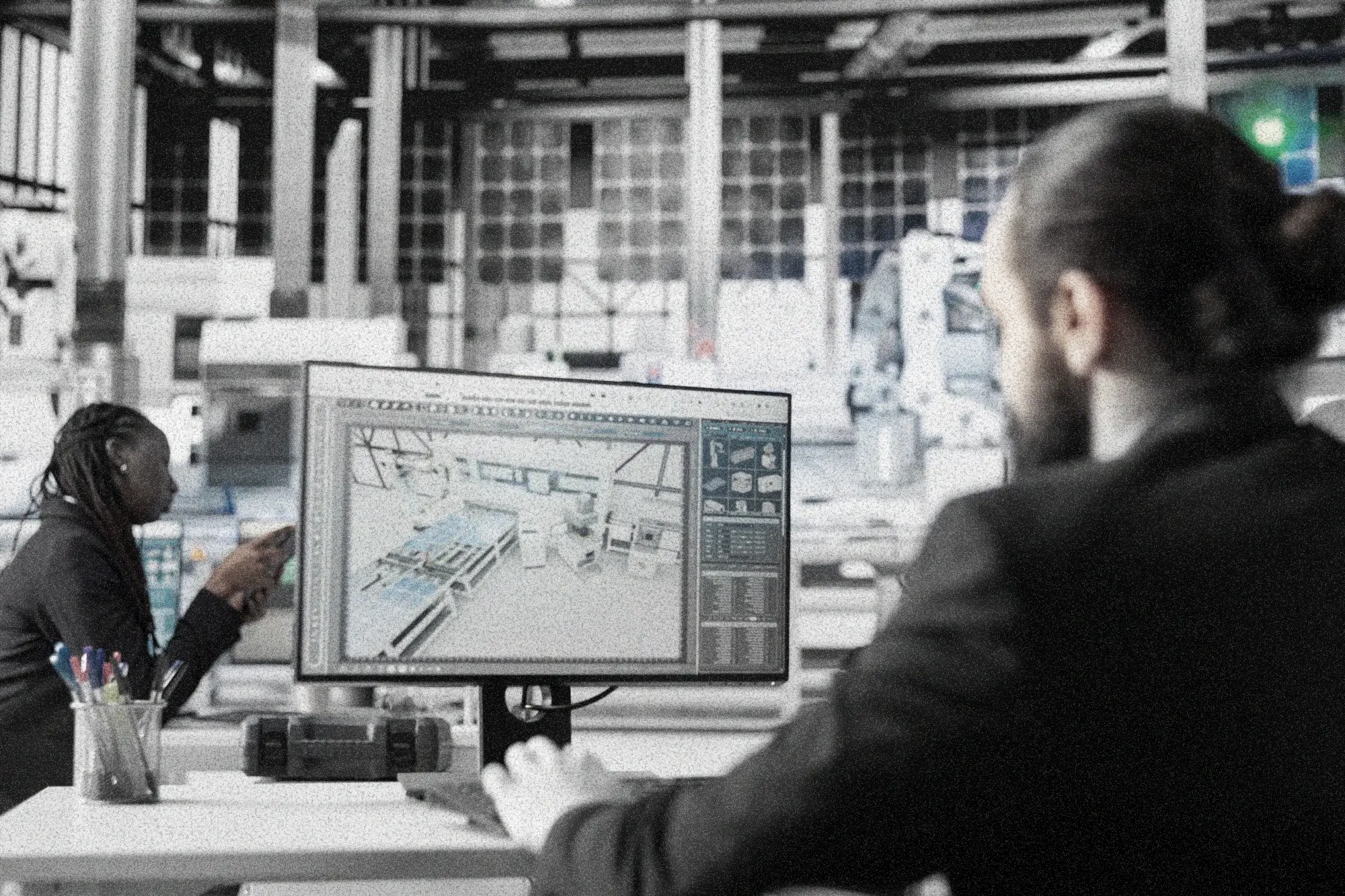 A image of a concrete sphere, balanced between two other larger spheres