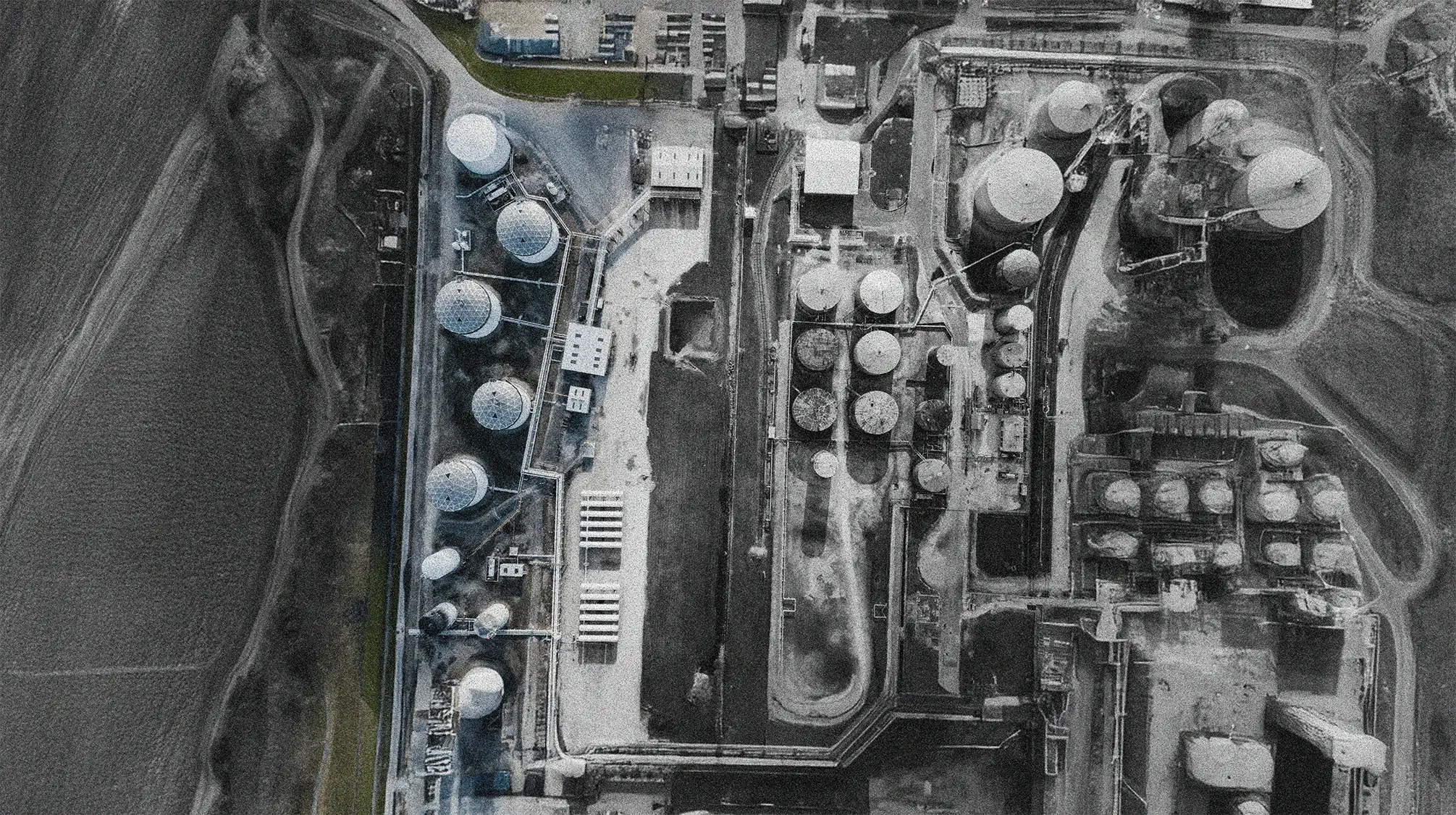 A render of three white cylindrical columns, against a warm creme background
